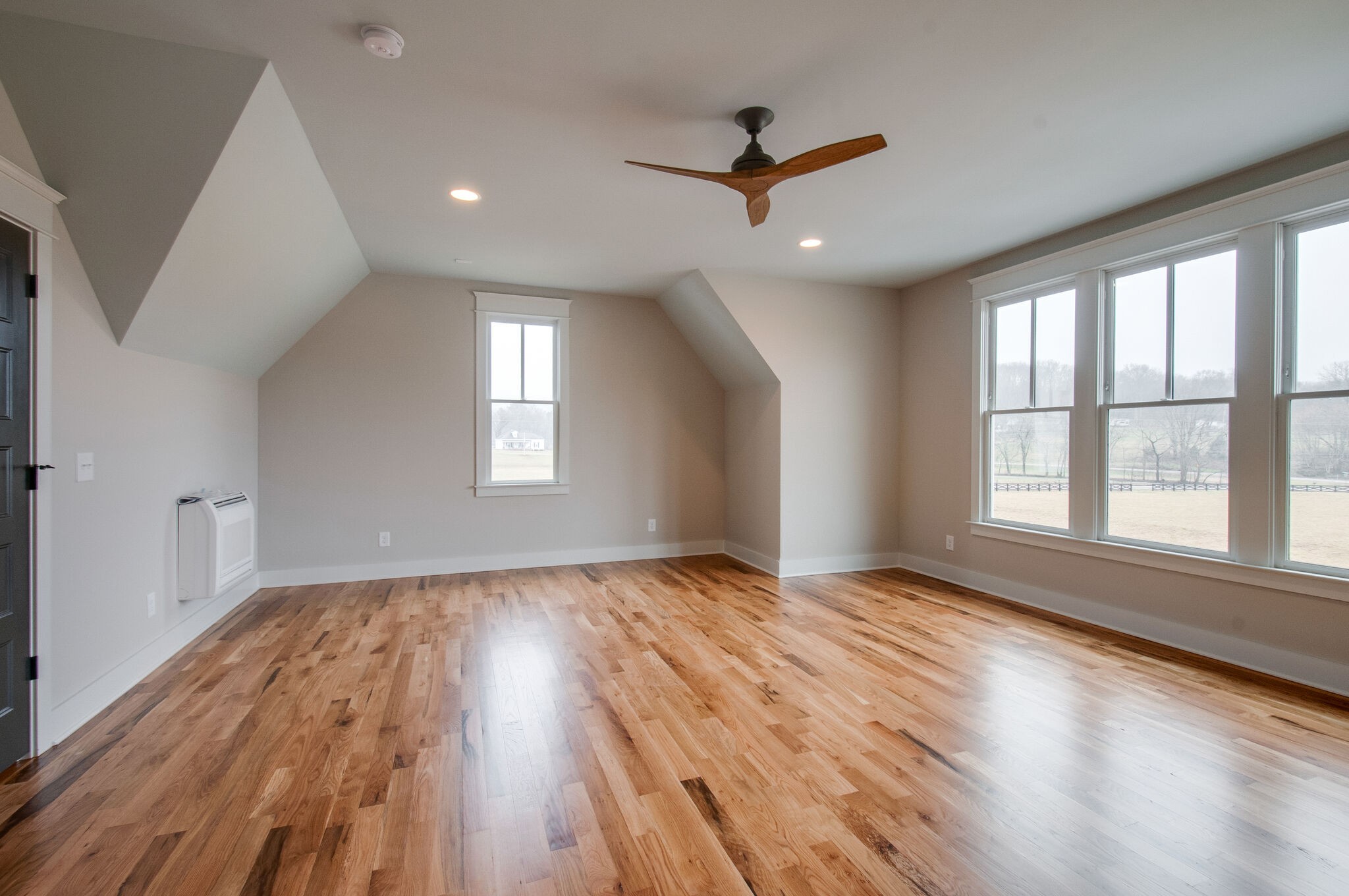 4510 Harpeth School Road Franklin, TN 37064 - Photo 40 of 43 a view of empty room with wooden floor and fan