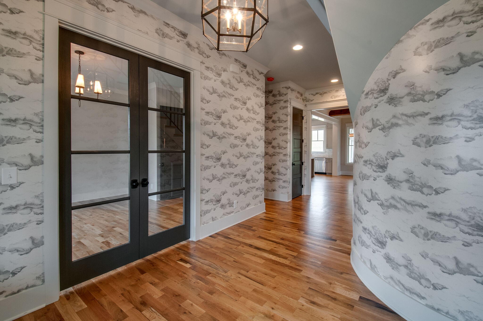 4510 Harpeth School Road Franklin, TN 37064 - Photo 7 of 43 a view of a hallway with wooden floor and glass door