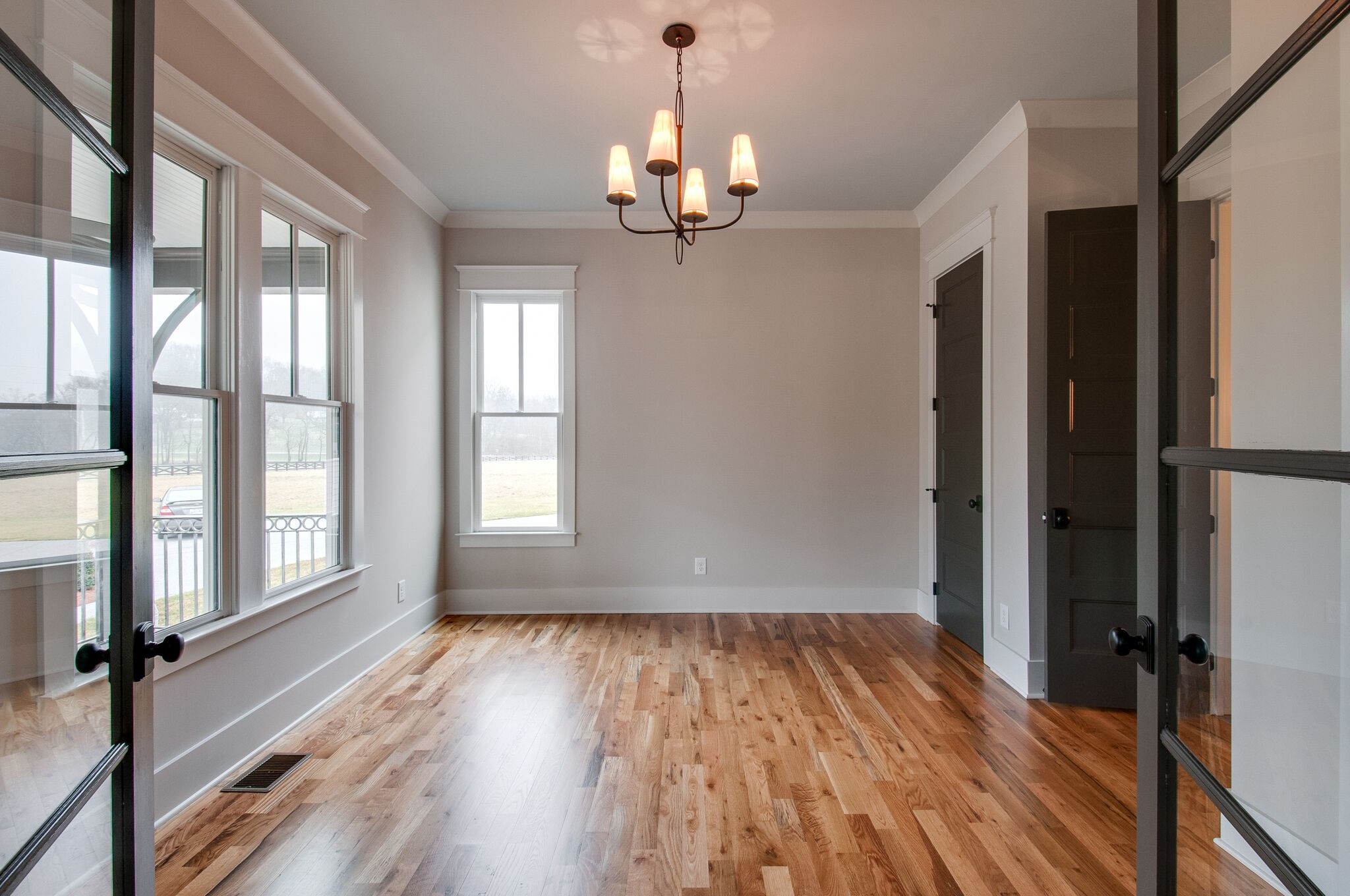4510 Harpeth School Road Franklin, TN 37064 - Photo 8 of 43 a view of empty room with wooden floor and fan