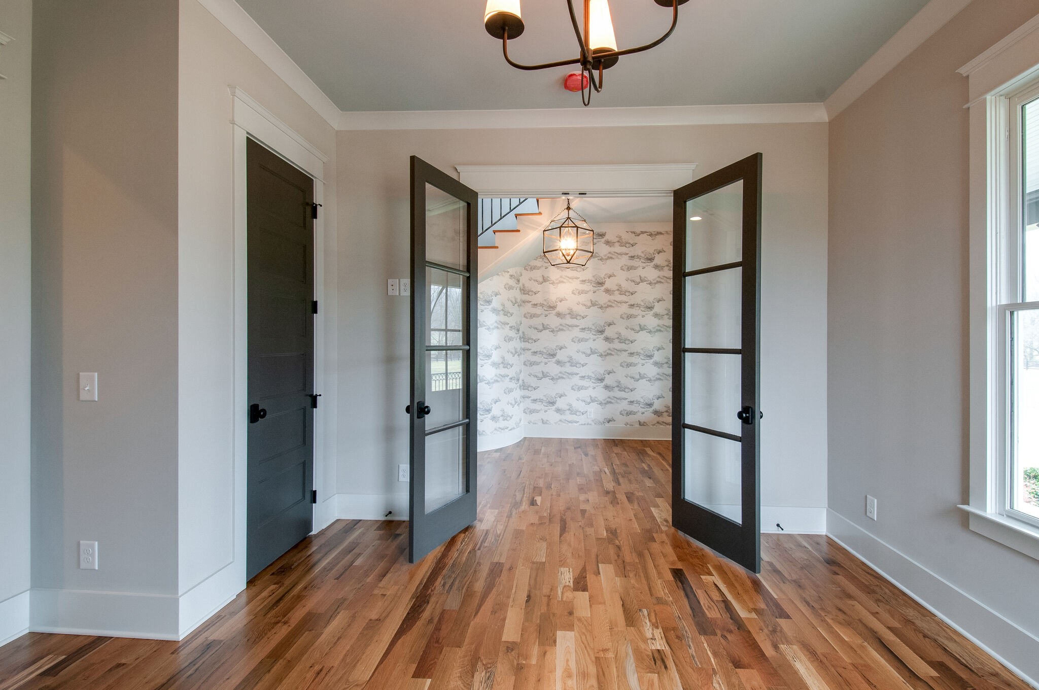 4510 Harpeth School Road Franklin, TN 37064 - Photo 9 of 43 a view of empty room with wooden floor and fan