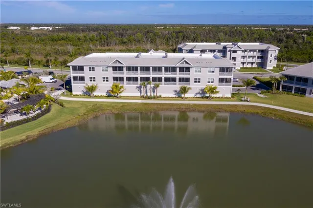 a view of a lake with building in front of it
