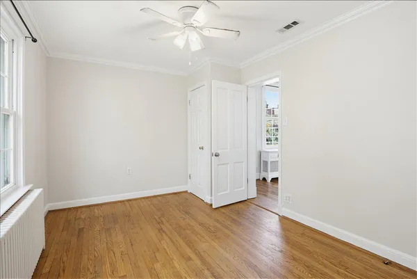 a bathroom with a sink vanity and a mirror