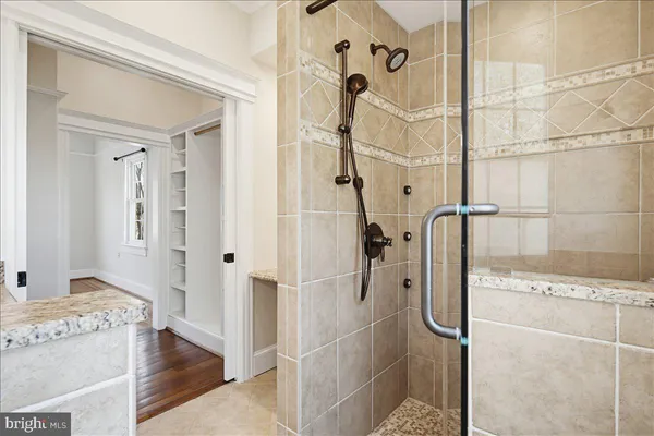 a backyard of a house with yard and outdoor seating