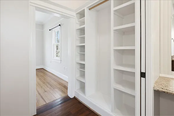 a view of a park with large trees