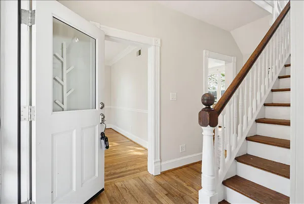 a kitchen with granite countertop cabinets sink and window
