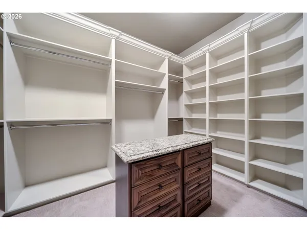 a view of cabinets and window