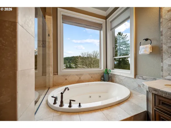 a view of a bath tub sitting in a bathroom