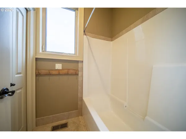 a bathroom with a window