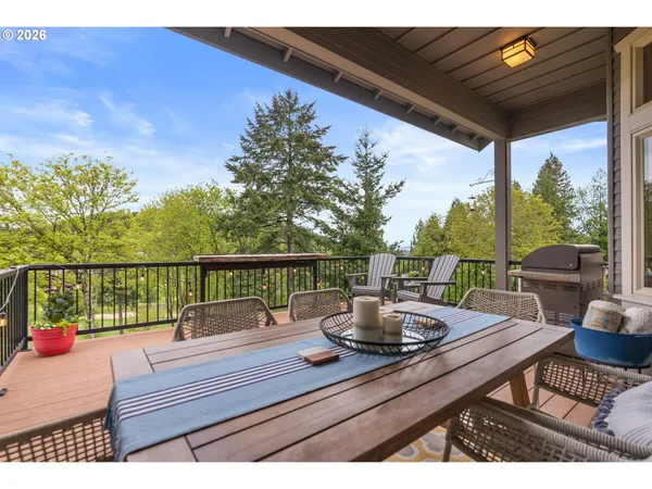 a view of sitting area with furniture and wooden floor