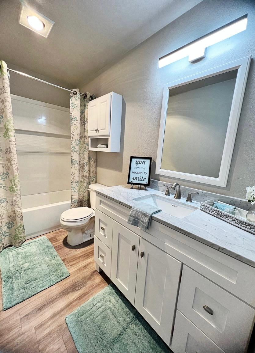 3226 90th Street Lubbock, TX 79423 - Photo 12 of 15 Hall Bathroom