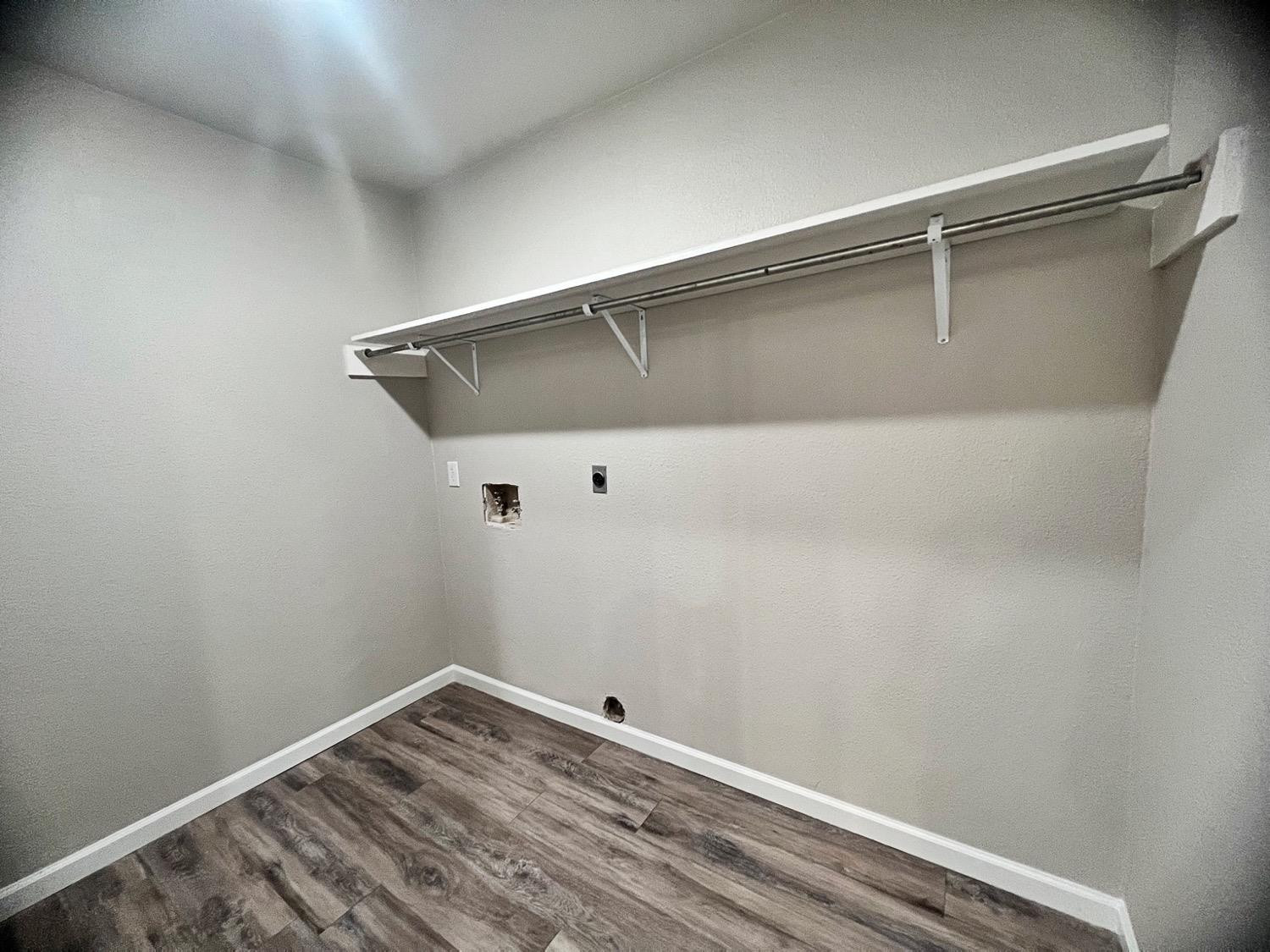 3226 90th Street Lubbock, TX 79423 - Photo 14 of 15 Laundry room with storage space