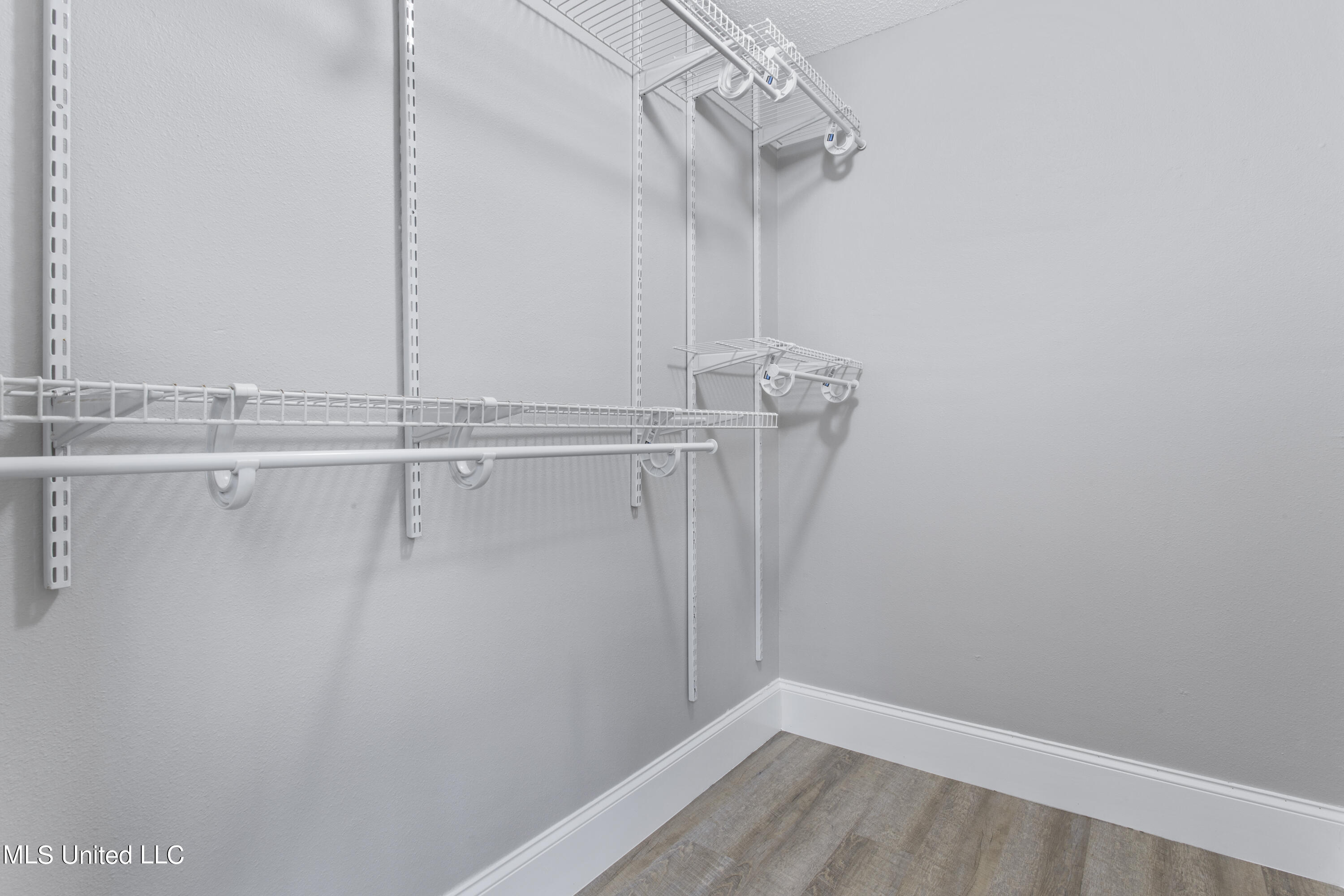 13907 Omega Road Vancleave, MS 39565 - Photo 17 of 27 Primary suite walk-in closet