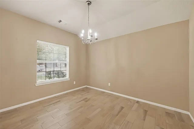 a view of an empty room with window