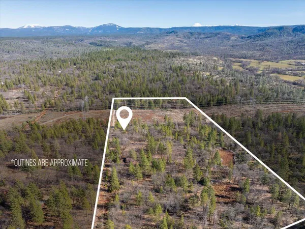 a view of an outdoor space and a mountain view