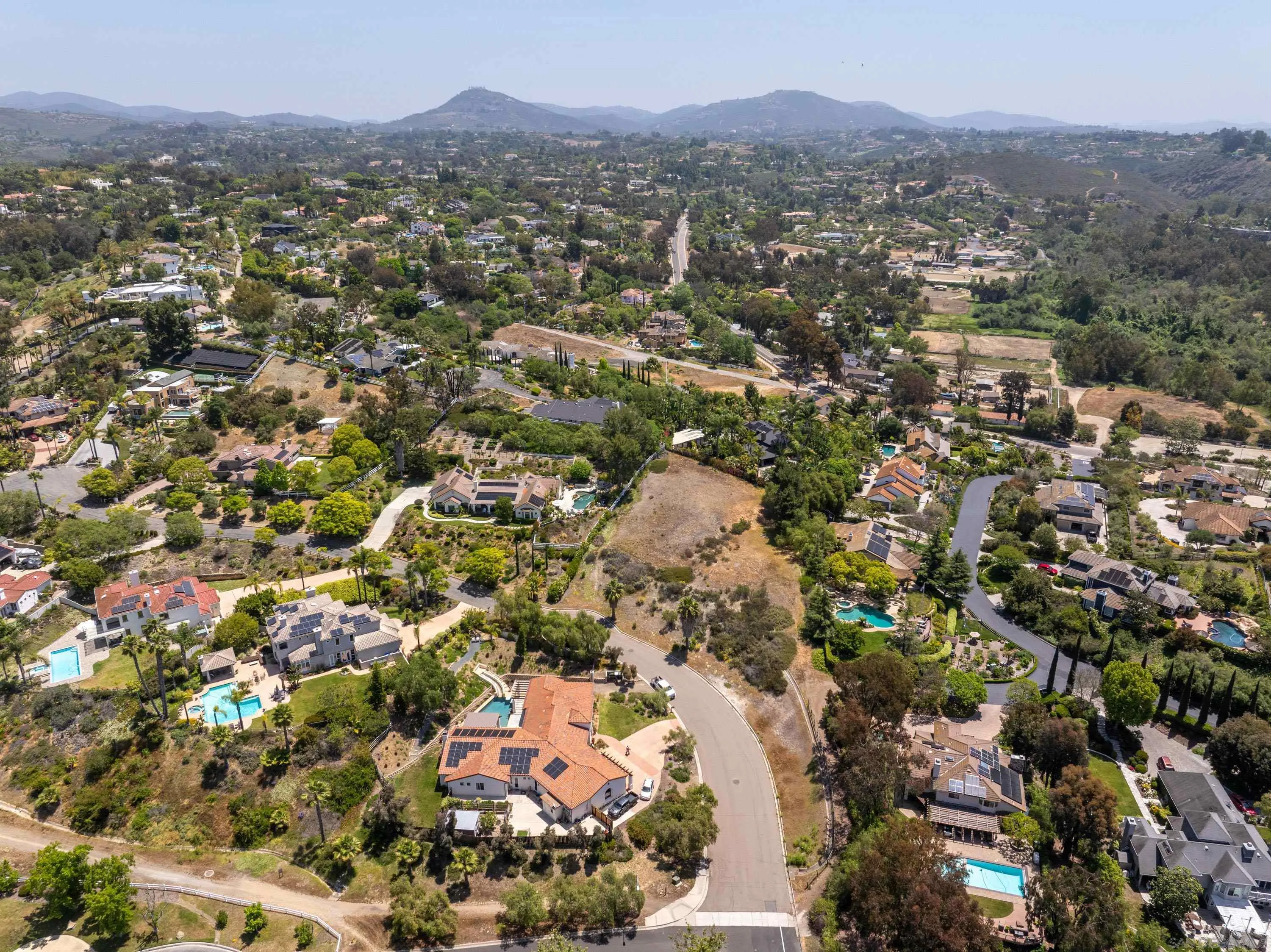 0 Calle Rancho Vista, Unit 18 Encinitas, CA 92024 - Photo 13 of 17 an aerial view of residential houses with outdoor space and trees