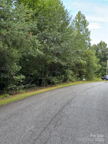 a view of a yard with an empty space