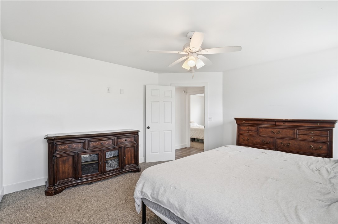 728 East Northern Avenue Springfield, OH 45503 - Photo 18 of 35 This spacious bedroom offers ample comfort and an inviting ambiance, perfect for relaxation.