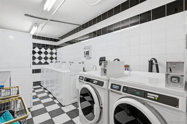a utility room with dryer and washer