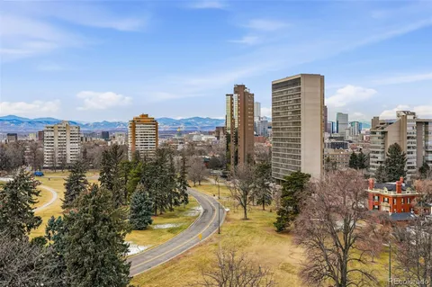 a view of a city with tall buildings