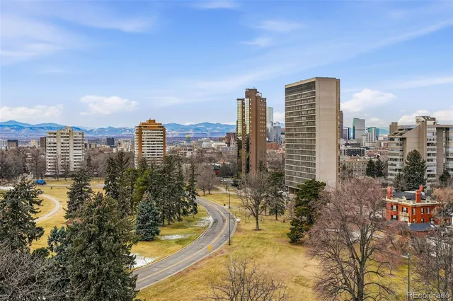 a view of a city with tall buildings