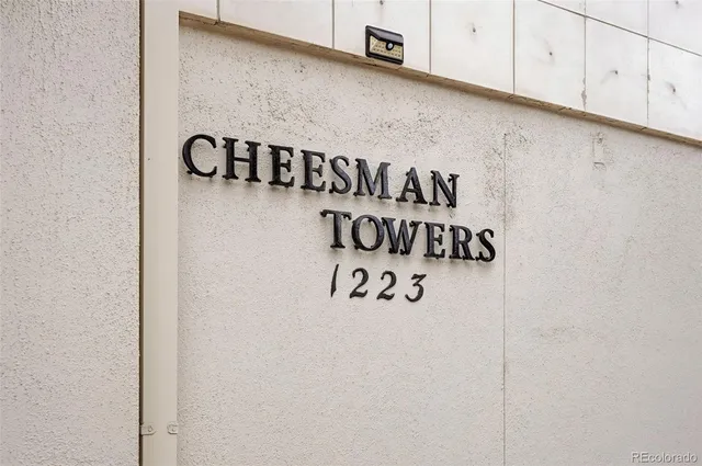 a wall with a signage