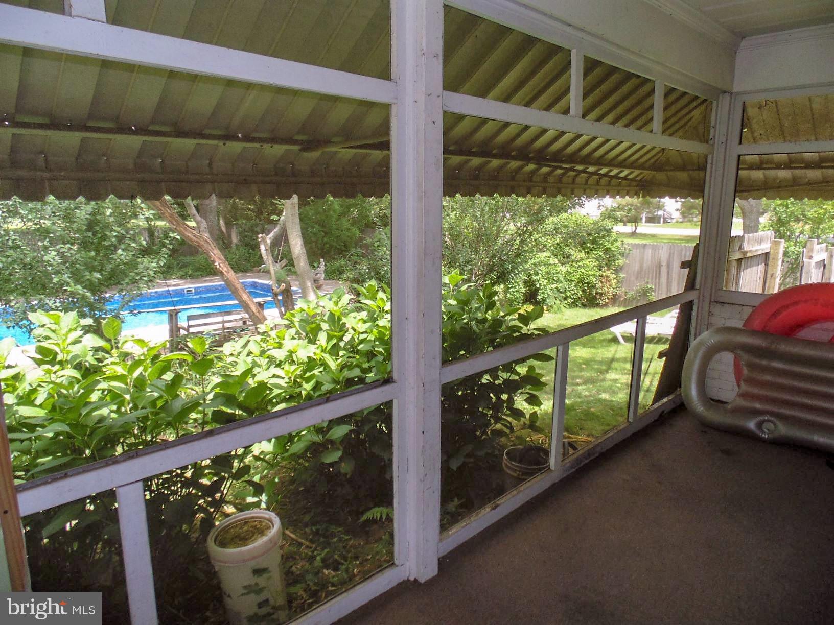 1296 Steamboat Road Shady Side, MD 20764 - Photo 21 of 40 Sun room on the side of the house