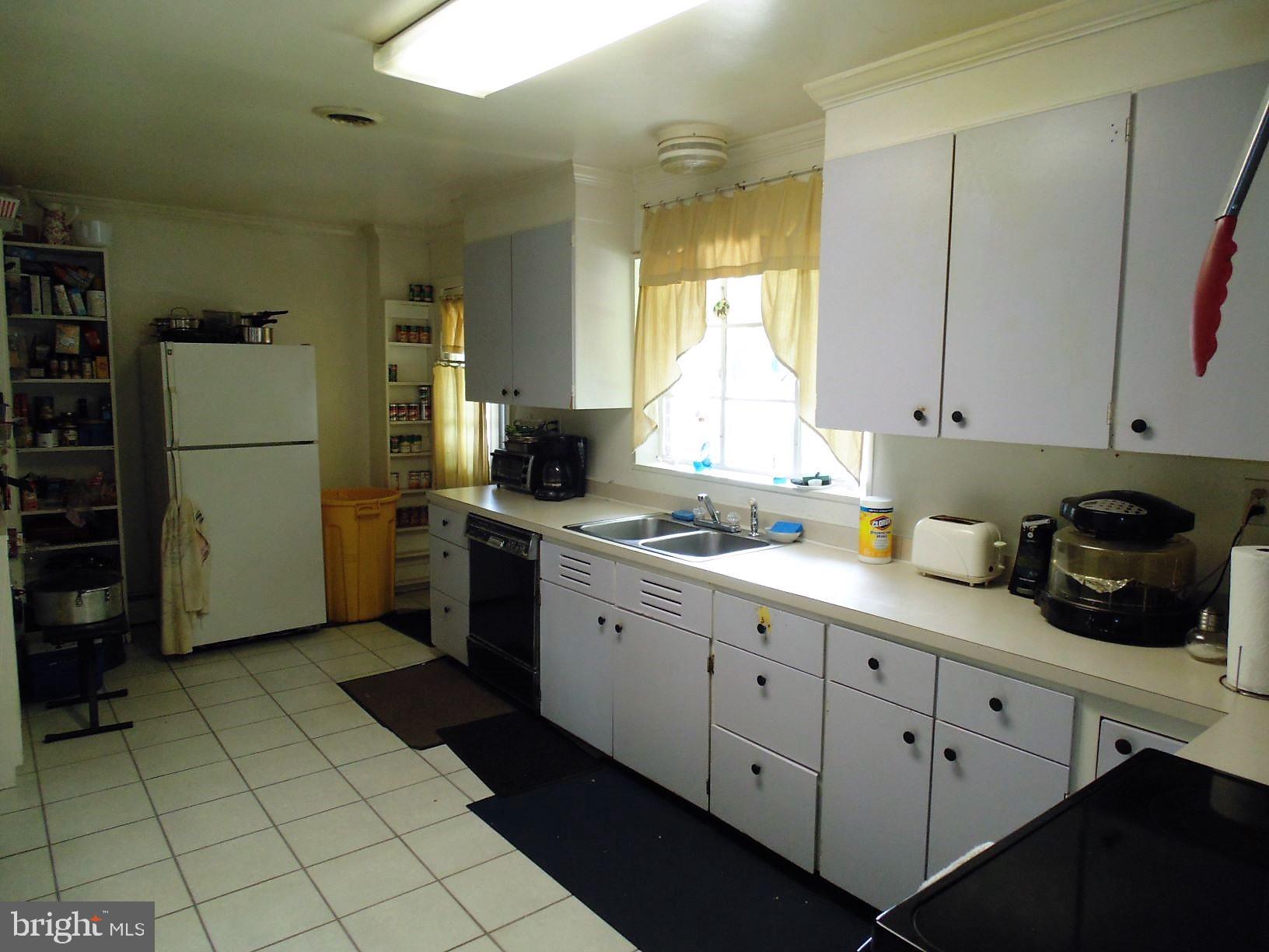 1296 Steamboat Road Shady Side, MD 20764 - Photo 7 of 40 Kitchen in 19' long and 11' wide