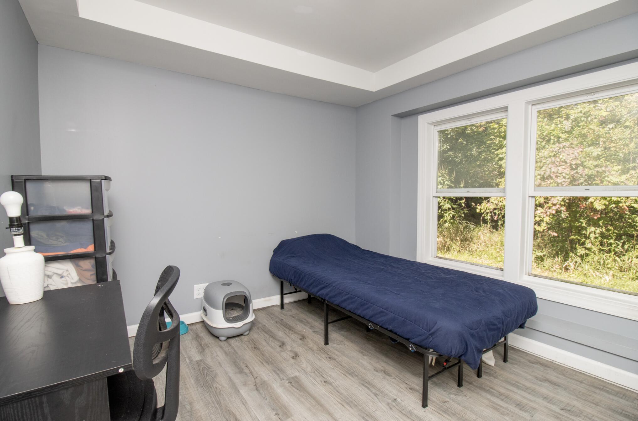 15806 Clark Street Lowell, IN 46356 - Photo 16 of 35 a view of a workspace with furniture and a window
