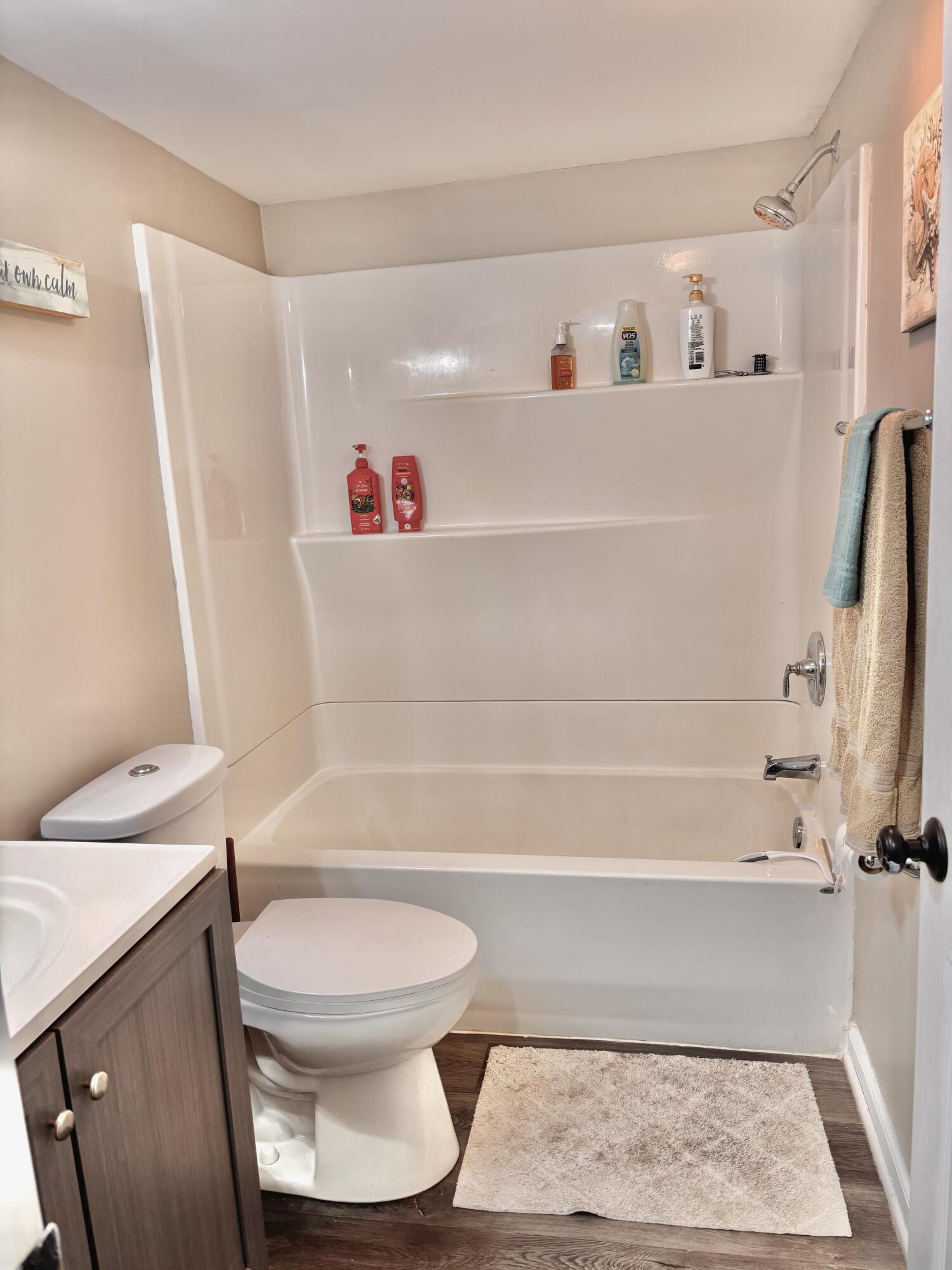 15806 Clark Street Lowell, IN 46356 - Photo 19 of 35 a bathroom with a toilet and a shower