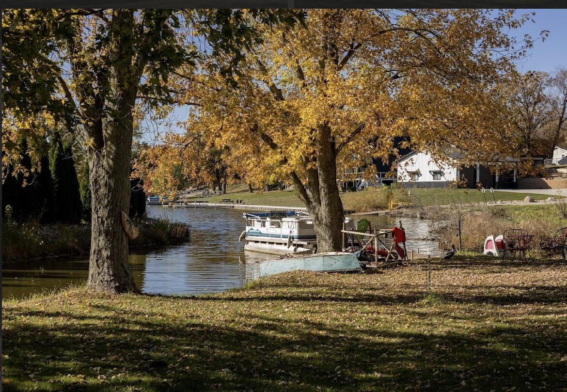 15806 Clark Street Lowell, IN 46356 - Photo 29 of 35 a view of a lake with a tree