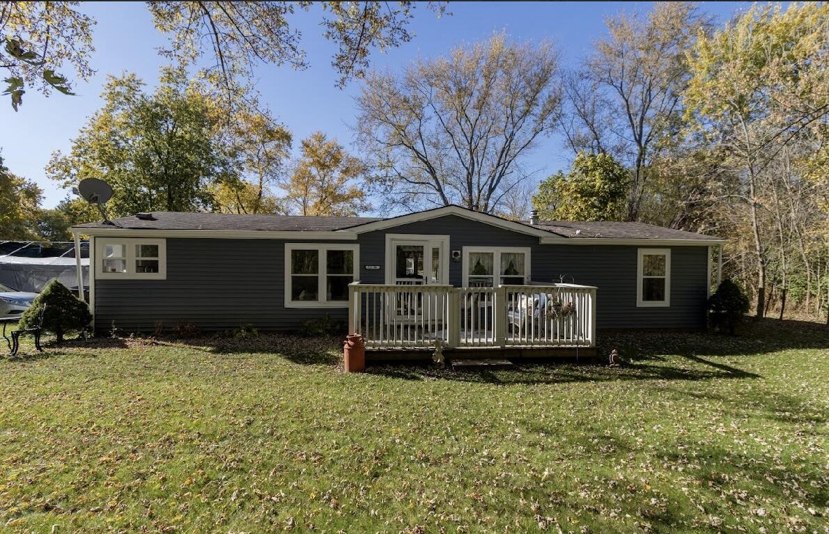 15806 Clark Street Lowell, IN 46356 - Photo 31 of 35 a front view of a house with a yard