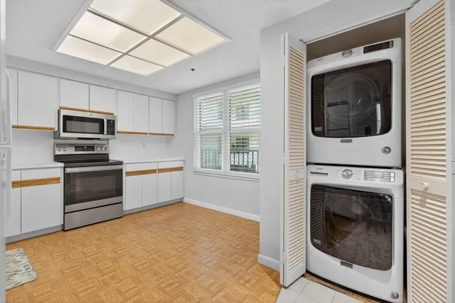 a view of a balcony with wooden floor
