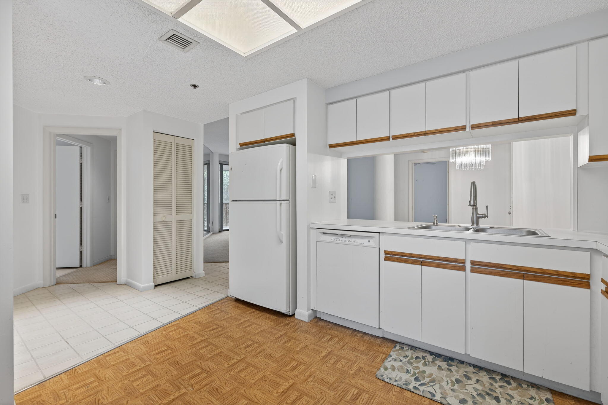 221 Northeast Plantation Road, Unit 213 Stuart, FL 34996 - Photo 36 of 44 a bathroom with a sink and a mirror