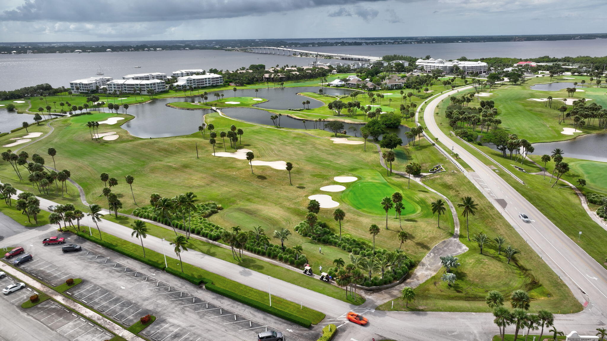 221 Northeast Plantation Road, Unit 213 Stuart, FL 34996 - Photo 43 of 44 a view of a lake with a city