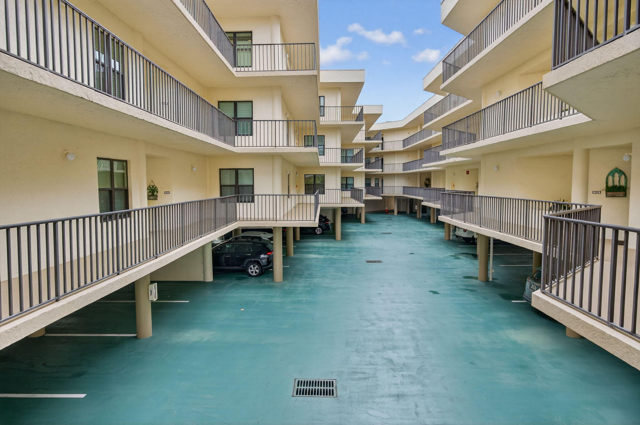 221 Northeast Plantation Road, Unit 213 Stuart, FL 34996 - Photo 6 of 44 a view of a house with a large window