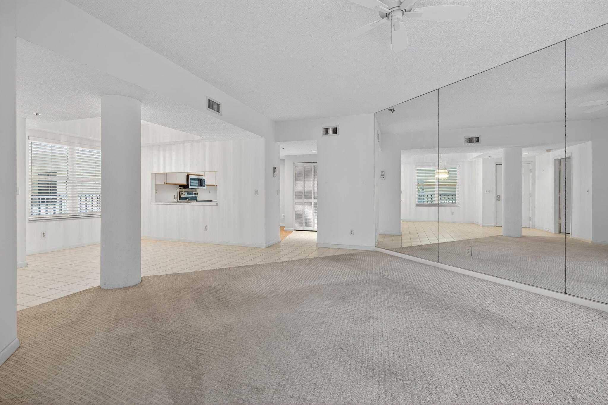 221 Northeast Plantation Road, Unit 213 Stuart, FL 34996 - Photo 9 of 44 a view of an empty room with a window