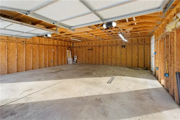 a view of a room with wooden walls