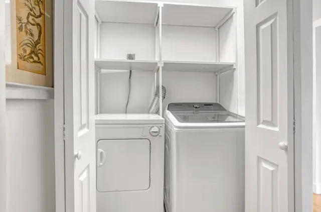 a utility room with dryer and washer