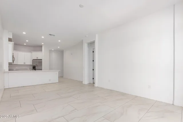 a view of kitchen with white kitchen