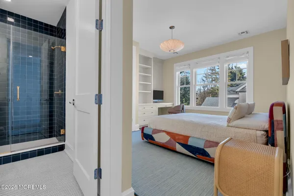 a view of a room with wooden walls