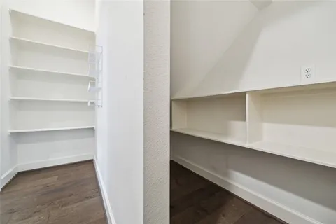 a view of an empty walk in closet