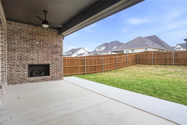 a view of a backyard with a garden and staircase