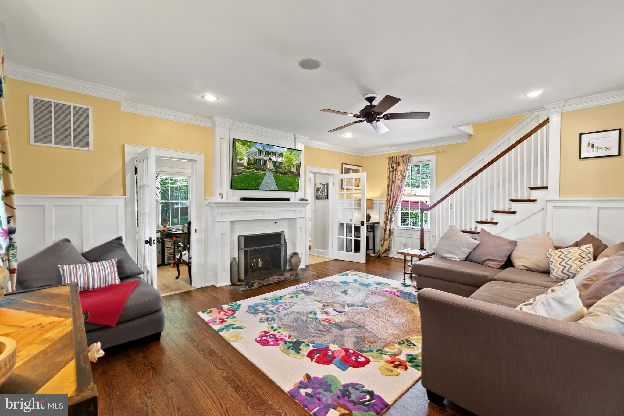 113 West Braddock Road Alexandria, VA 22301 - Photo 5 of 36 Large living room with wood burning fireplace