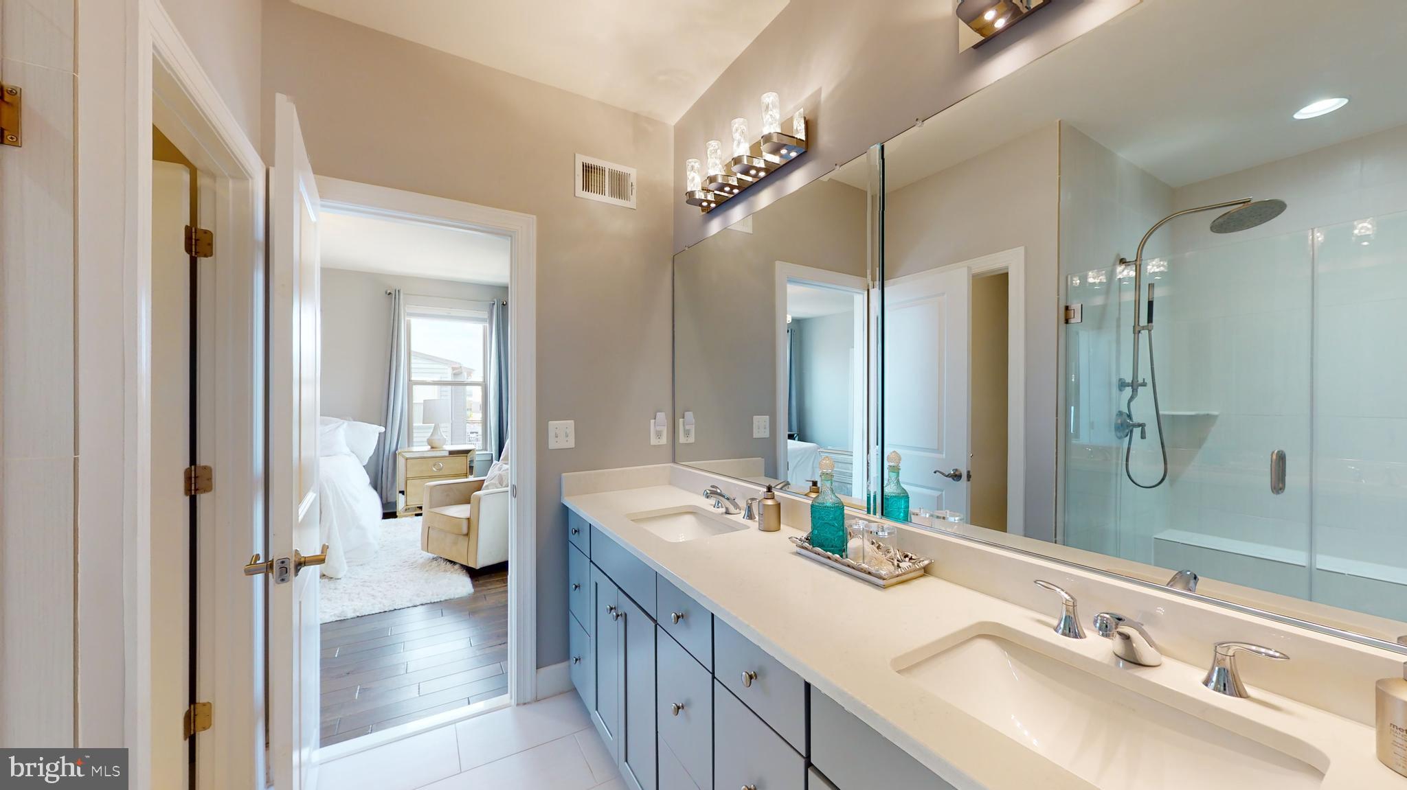 9851 Buchanan Loop Manassas, VA 20110 - Photo 56 of 70 master bath with upgraded light fixtures