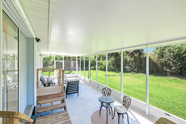 a house view with a sitting space and garden view