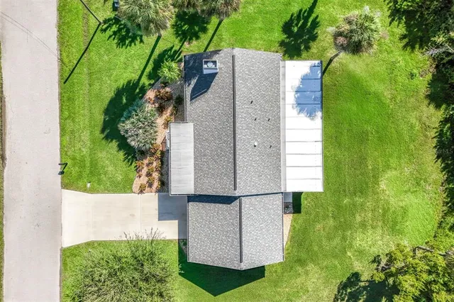 an aerial view of a house having garden