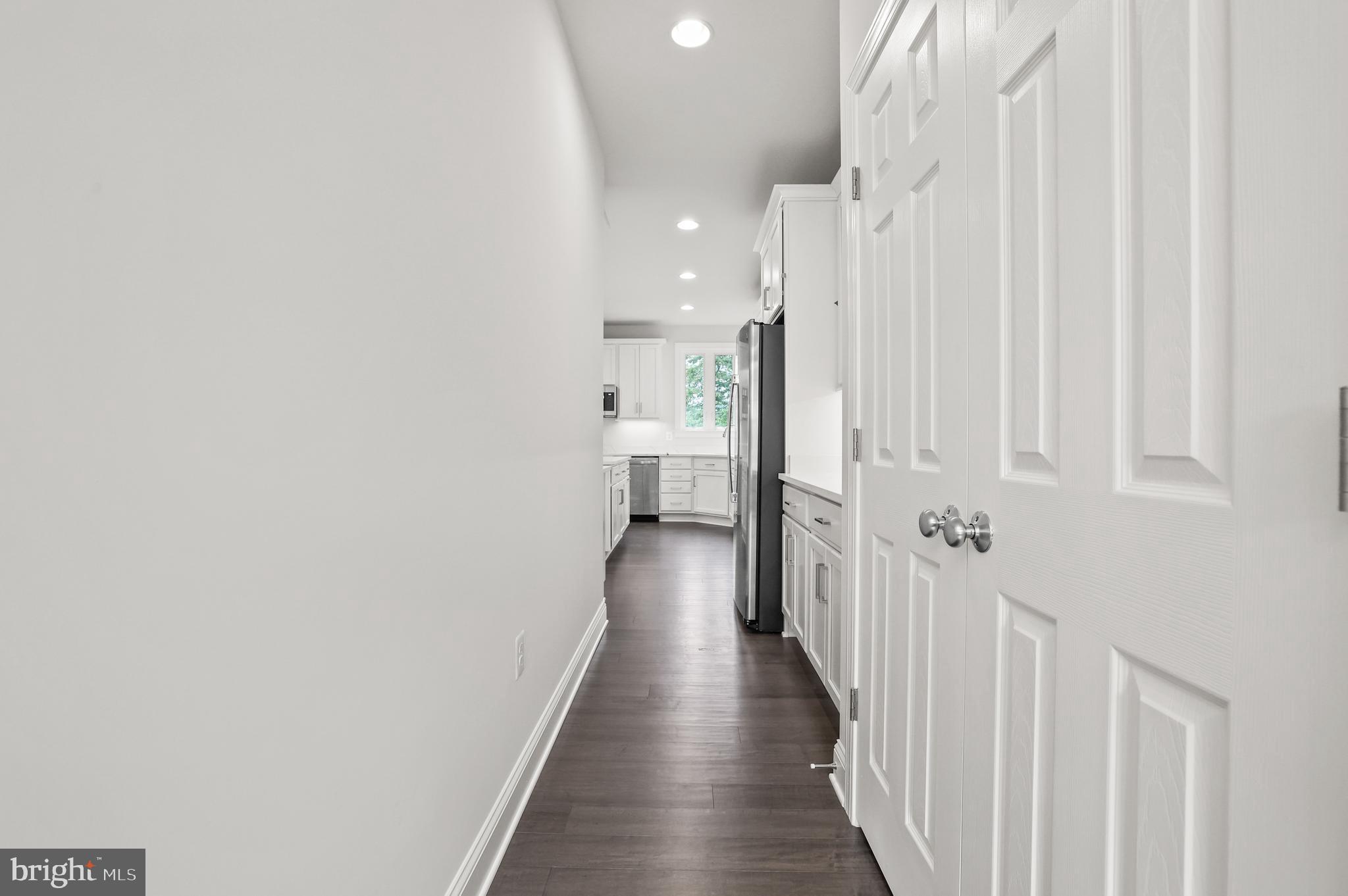 14496 Aurora Drive Woodbridge, VA 22193 - Photo 15 of 70 a view of a hallway with wooden floor and staircase