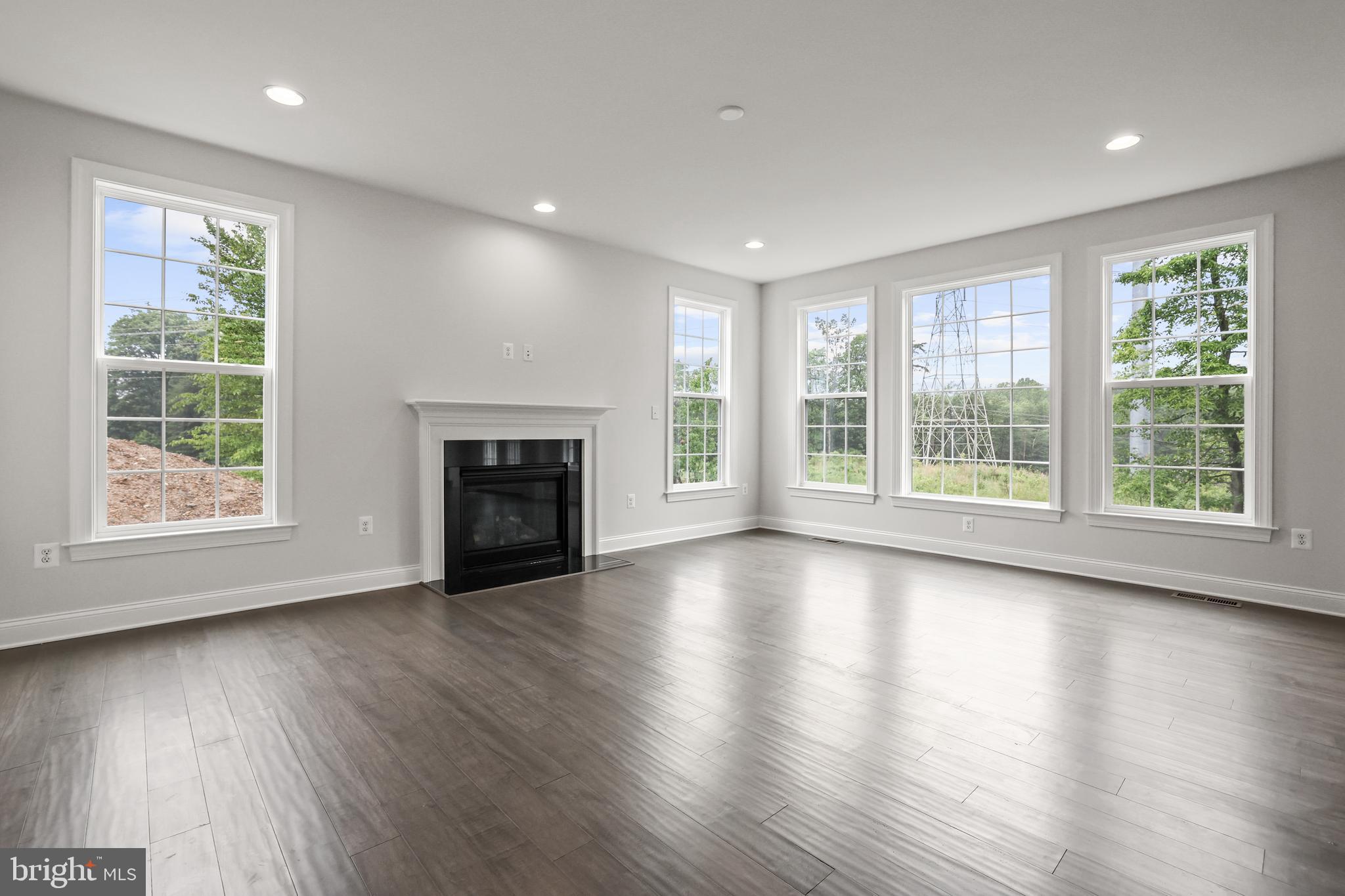 14496 Aurora Drive Woodbridge, VA 22193 - Photo 18 of 70 a view of an empty room with wooden floor and a window
