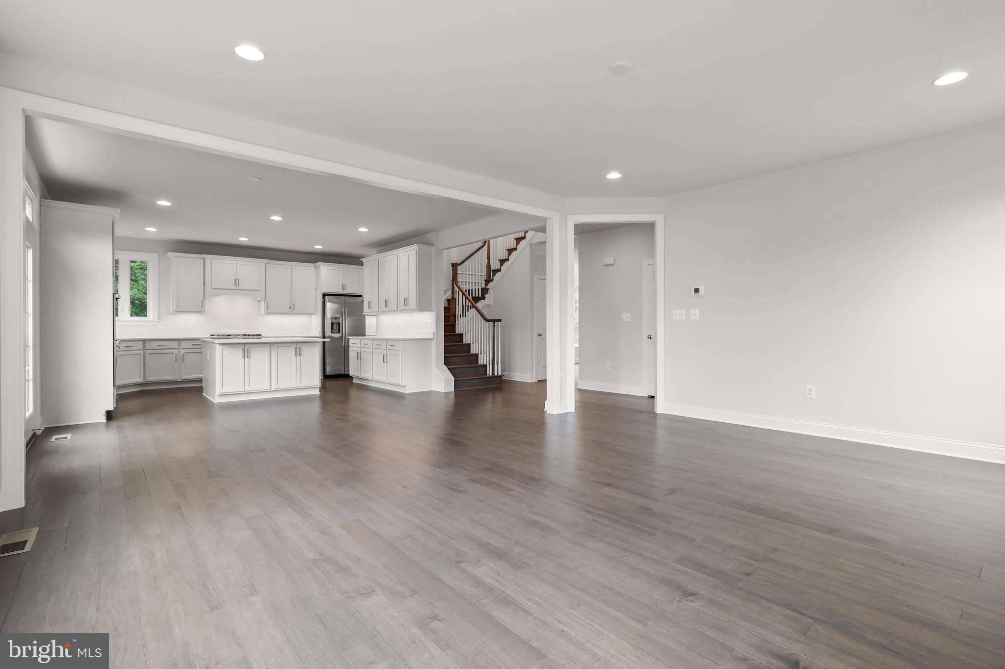 14496 Aurora Drive Woodbridge, VA 22193 - Photo 21 of 70 a view of a kitchen with a sink and a refrigerator