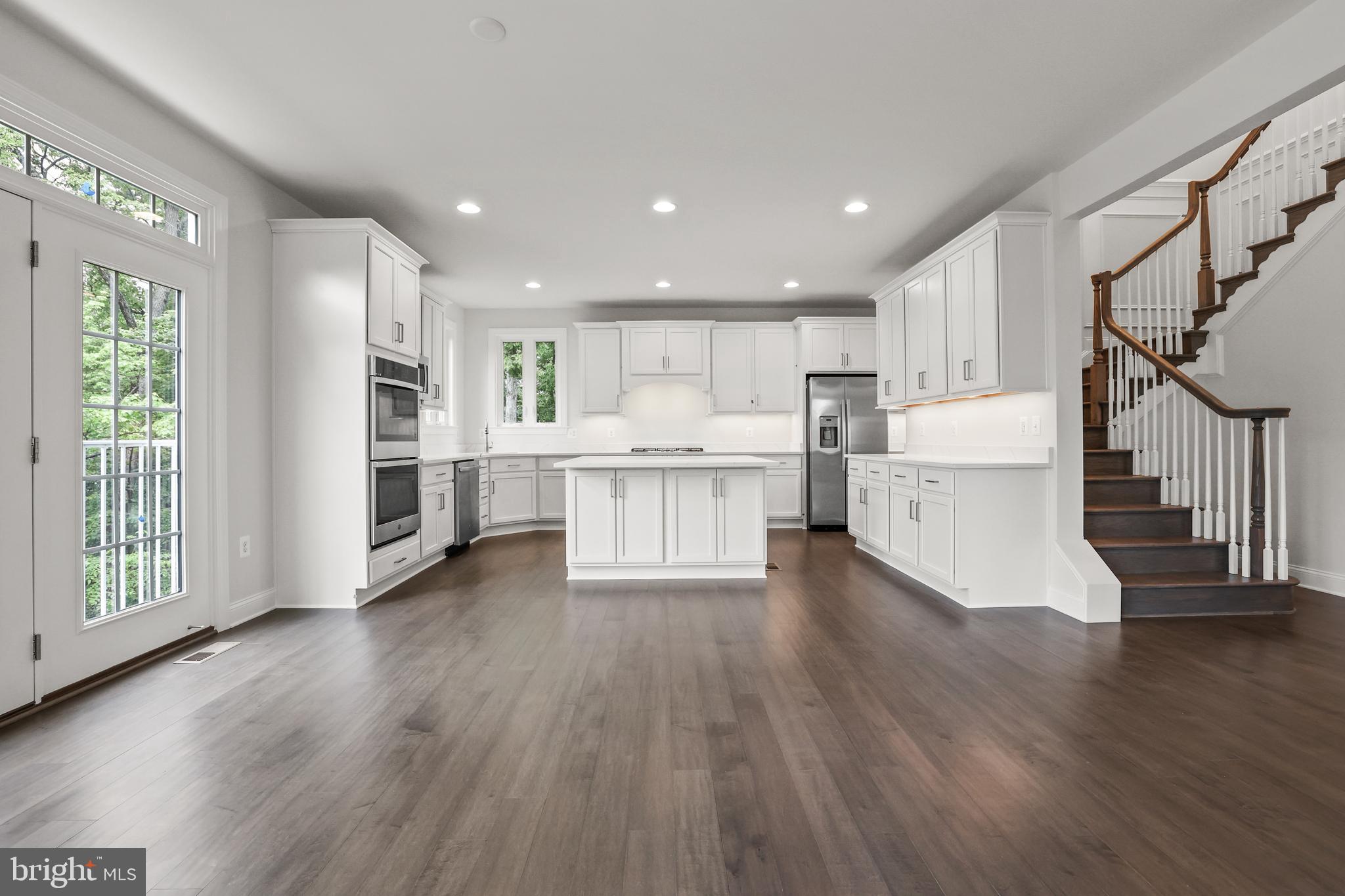 14496 Aurora Drive Woodbridge, VA 22193 - Photo 22 of 70 a view of a kitchen with wooden floor and electronic appliances
